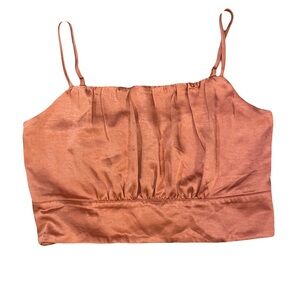 pink satin-looking cropped tank top